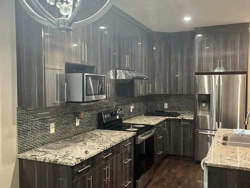 2518 22 Avenue, Edmonton, AB - Indoor Photo Showing Kitchen With Double Sink With Upgraded Kitchen