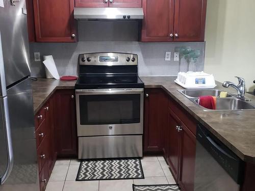 39 230 Edward Drive Drive Sw, Edmonton, AB - Indoor Photo Showing Kitchen With Double Sink