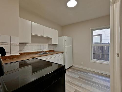 11712 84 Street, Edmonton, AB - Indoor Photo Showing Kitchen With Double Sink