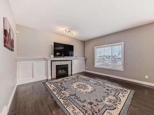 8402 94 Street, Morinville, AB - Indoor Photo Showing Other Room With Fireplace