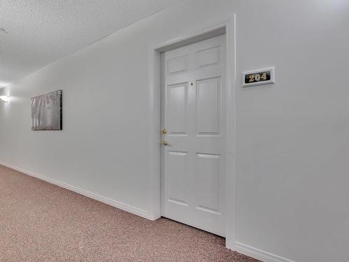 204 5106 49 Avenue, Leduc, AB - Indoor Photo Showing Other Room