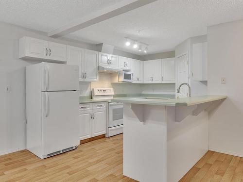 204 5106 49 Avenue, Leduc, AB - Indoor Photo Showing Kitchen