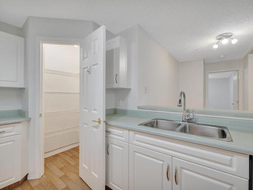 204 5106 49 Avenue, Leduc, AB - Indoor Photo Showing Kitchen With Double Sink