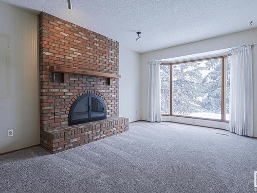 7518 183A Street Nw, Edmonton, AB - Indoor Photo Showing Living Room With Fireplace