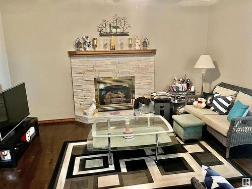 4126 46 Street, Vegreville, AB - Indoor Photo Showing Living Room With Fireplace