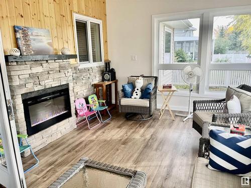 4126 46 Street, Vegreville, AB - Indoor Photo Showing Living Room With Fireplace