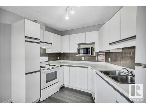 Edmonton, AB - Indoor Photo Showing Kitchen With Double Sink