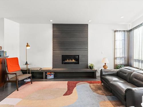 6428 Ada Boulevard, Edmonton, AB - Indoor Photo Showing Living Room With Fireplace