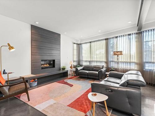 6428 Ada Boulevard, Edmonton, AB - Indoor Photo Showing Living Room With Fireplace