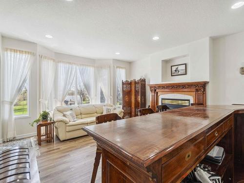 56220 Rge Rd 231, Rural Sturgeon County, AB - Indoor Photo Showing Living Room With Fireplace