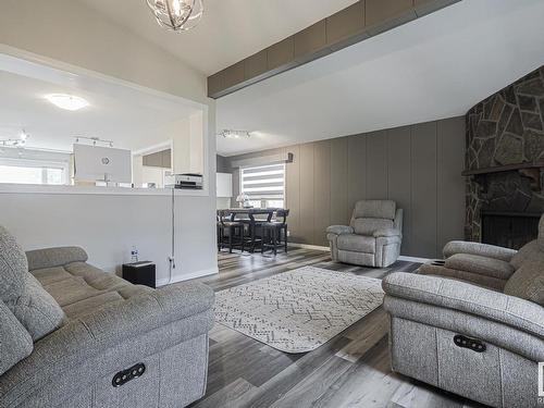 4807 122A Street, Edmonton, AB - Indoor Photo Showing Living Room With Fireplace