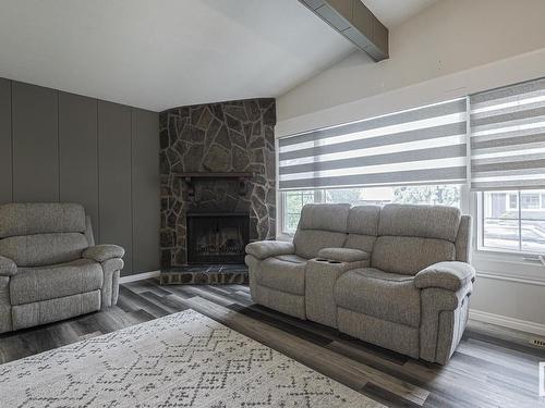 4807 122A Street, Edmonton, AB - Indoor Photo Showing Living Room With Fireplace