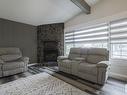 4807 122A Street, Edmonton, AB  - Indoor Photo Showing Living Room With Fireplace 