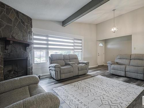 4807 122A Street, Edmonton, AB - Indoor Photo Showing Living Room With Fireplace