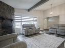 4807 122A Street, Edmonton, AB  - Indoor Photo Showing Living Room With Fireplace 