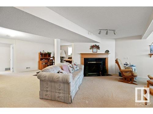 13825 130 Avenue, Edmonton, AB - Indoor Photo Showing Other Room With Fireplace