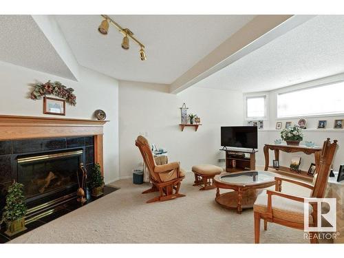 13825 130 Avenue, Edmonton, AB - Indoor Photo Showing Living Room With Fireplace