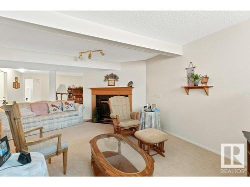 13825 130 Avenue, Edmonton, AB - Indoor Photo Showing Living Room With Fireplace