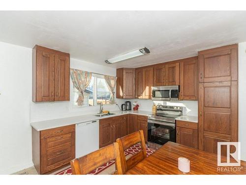 14530 30 Street Nw, Edmonton, AB - Indoor Photo Showing Kitchen With Double Sink