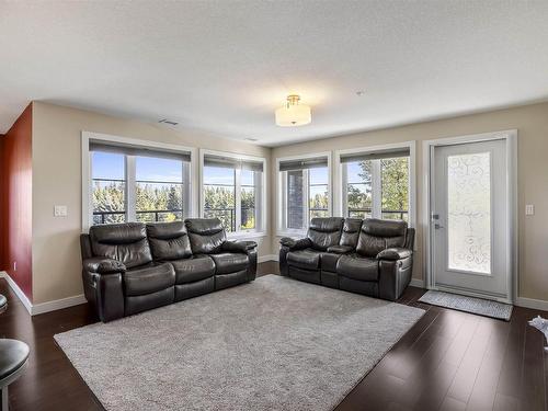 302 5025 Edgemont Boulevard Nw, Edmonton, AB - Indoor Photo Showing Living Room