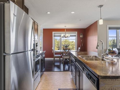 302 5025 Edgemont Boulevard Nw, Edmonton, AB - Indoor Photo Showing Kitchen With Double Sink