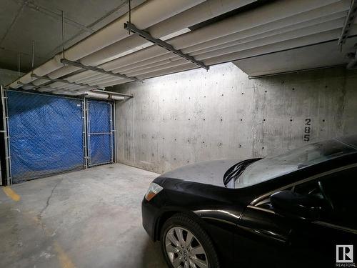 458 6079 Maynard Way, Edmonton, AB - Indoor Photo Showing Garage