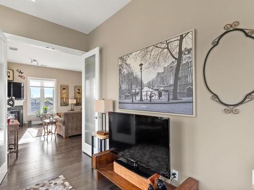 458 6079 Maynard Way, Edmonton, AB - Indoor Photo Showing Living Room