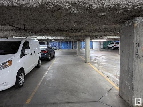 458 6079 Maynard Way, Edmonton, AB - Indoor Photo Showing Garage