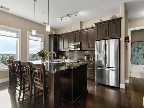 458 6079 Maynard Way, Edmonton, AB - Indoor Photo Showing Kitchen With Upgraded Kitchen