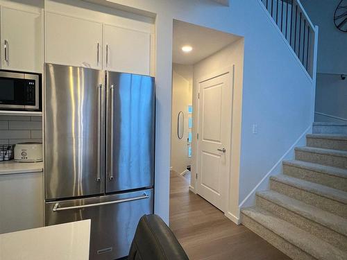 147 Stiles Bend, Leduc, AB - Indoor Photo Showing Kitchen With Stainless Steel Kitchen