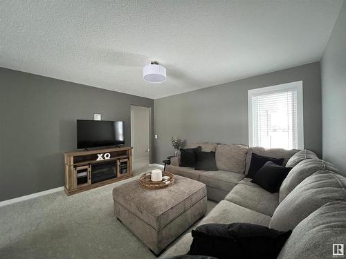 147 Stiles Bend, Leduc, AB - Indoor Photo Showing Living Room