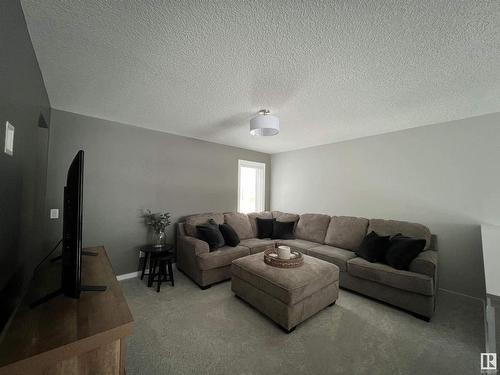 147 Stiles Bend, Leduc, AB - Indoor Photo Showing Living Room