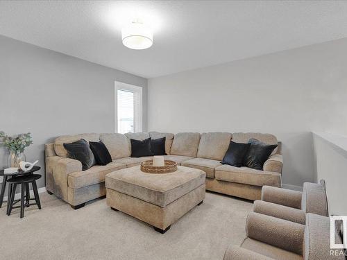 147 Stiles Bend, Leduc, AB - Indoor Photo Showing Living Room