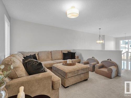 147 Stiles Bend, Leduc, AB - Indoor Photo Showing Living Room