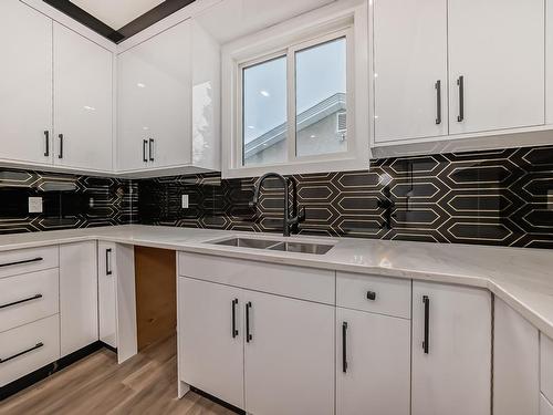 2-12122 43 Street, Edmonton, AB - Indoor Photo Showing Kitchen With Double Sink