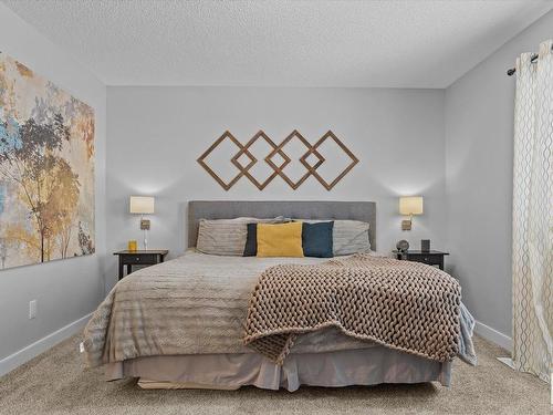 142 Radcliffe Wynd, Fort Saskatchewan, AB - Indoor Photo Showing Bedroom