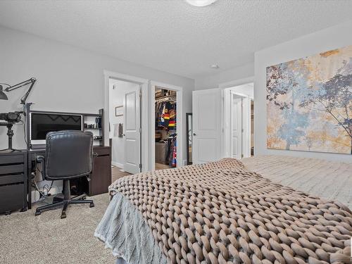 142 Radcliffe Wynd, Fort Saskatchewan, AB - Indoor Photo Showing Bedroom