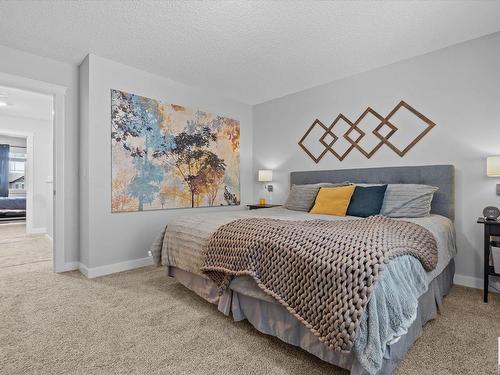 142 Radcliffe Wynd, Fort Saskatchewan, AB - Indoor Photo Showing Bedroom