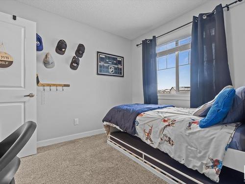 142 Radcliffe Wynd, Fort Saskatchewan, AB - Indoor Photo Showing Bedroom