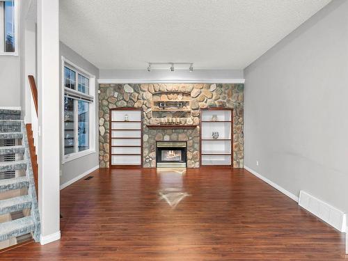 145 Dechene Road, Edmonton, AB - Indoor Photo Showing Living Room With Fireplace