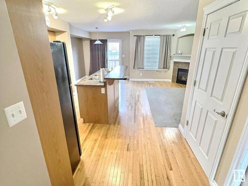 104 Hartwick Loop, Spruce Grove, AB - Indoor Photo Showing Other Room With Fireplace