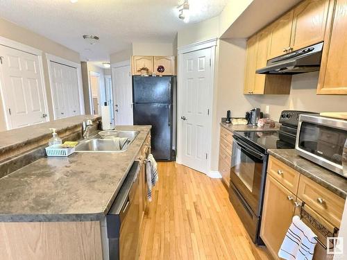 104 Hartwick Loop, Spruce Grove, AB - Indoor Photo Showing Kitchen With Double Sink