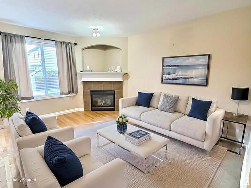 104 Hartwick Loop, Spruce Grove, AB - Indoor Photo Showing Living Room With Fireplace