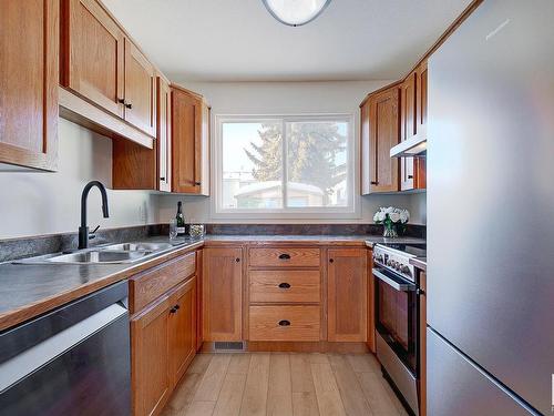 106 Dickinsfield Court, Edmonton, AB - Indoor Photo Showing Kitchen With Double Sink