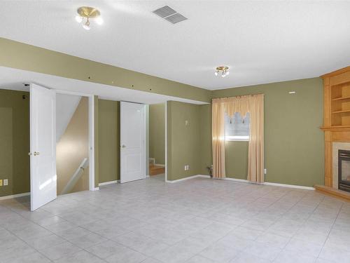 15004 131 Street, Edmonton, AB - Indoor Photo Showing Other Room With Fireplace