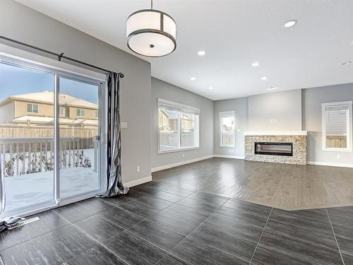 615 176 Street Sw, Edmonton, AB - Indoor Photo Showing Living Room With Fireplace