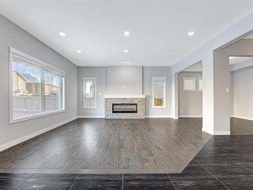 615 176 Street Sw, Edmonton, AB - Indoor Photo Showing Living Room With Fireplace