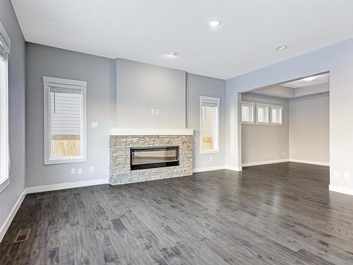 615 176 Street Sw, Edmonton, AB - Indoor Photo Showing Living Room With Fireplace