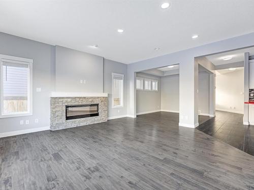 615 176 Street Sw, Edmonton, AB - Indoor Photo Showing Living Room With Fireplace