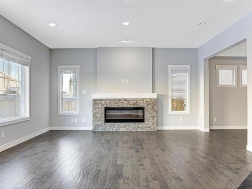 615 176 Street Sw, Edmonton, AB - Indoor Photo Showing Living Room With Fireplace